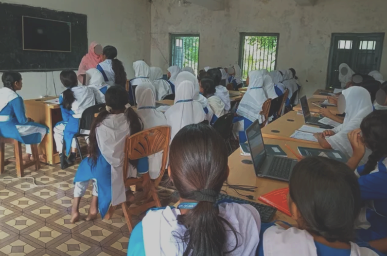 Students learning computer science together